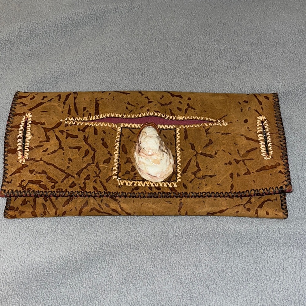 Women’s Boysterous handmade leather clutch